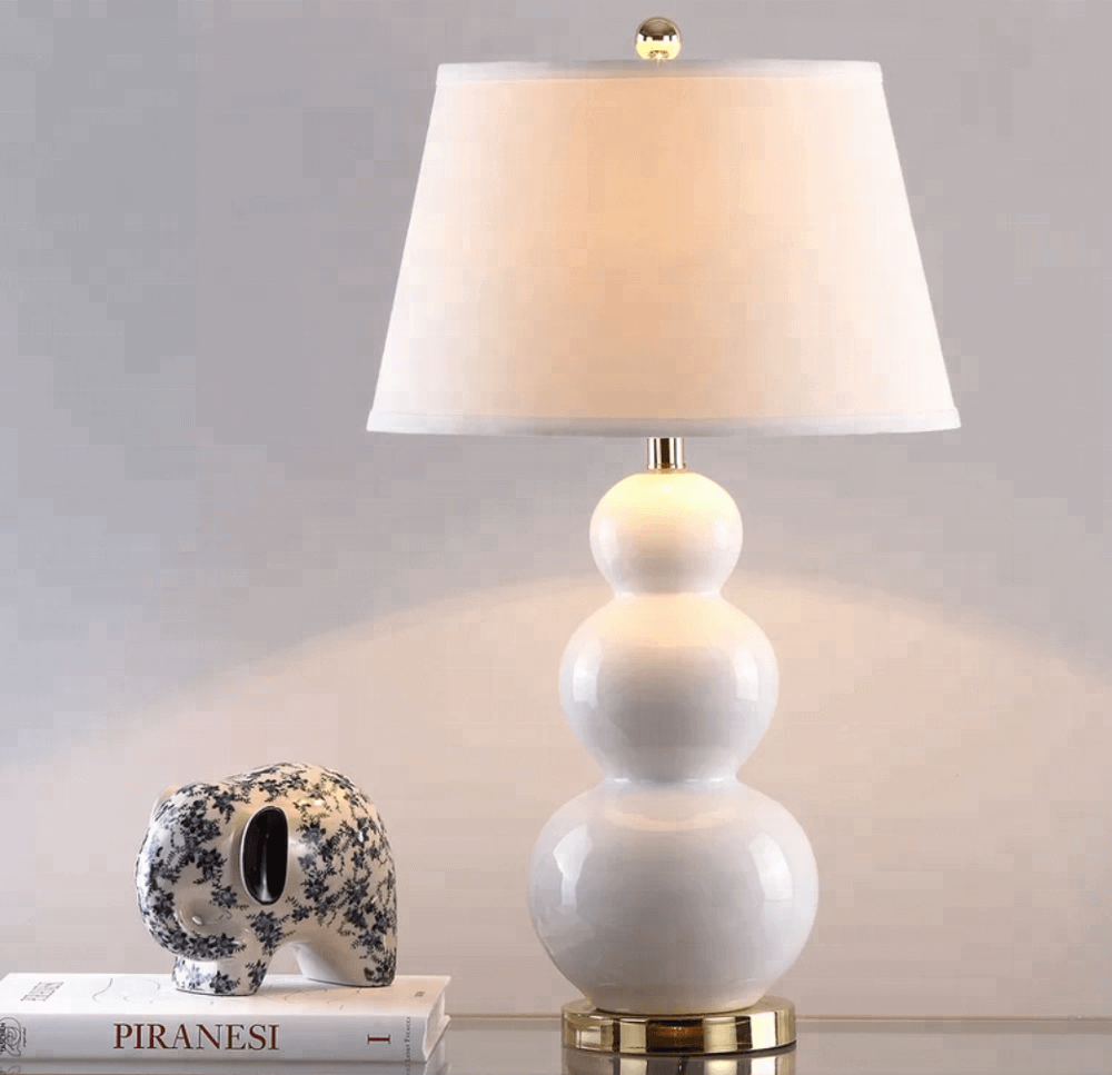 https://www.hotel-lamps.com/resources/assets/images/product_images/Hot-Sale-White-Ceramic-Table-Lamp-with (2).png